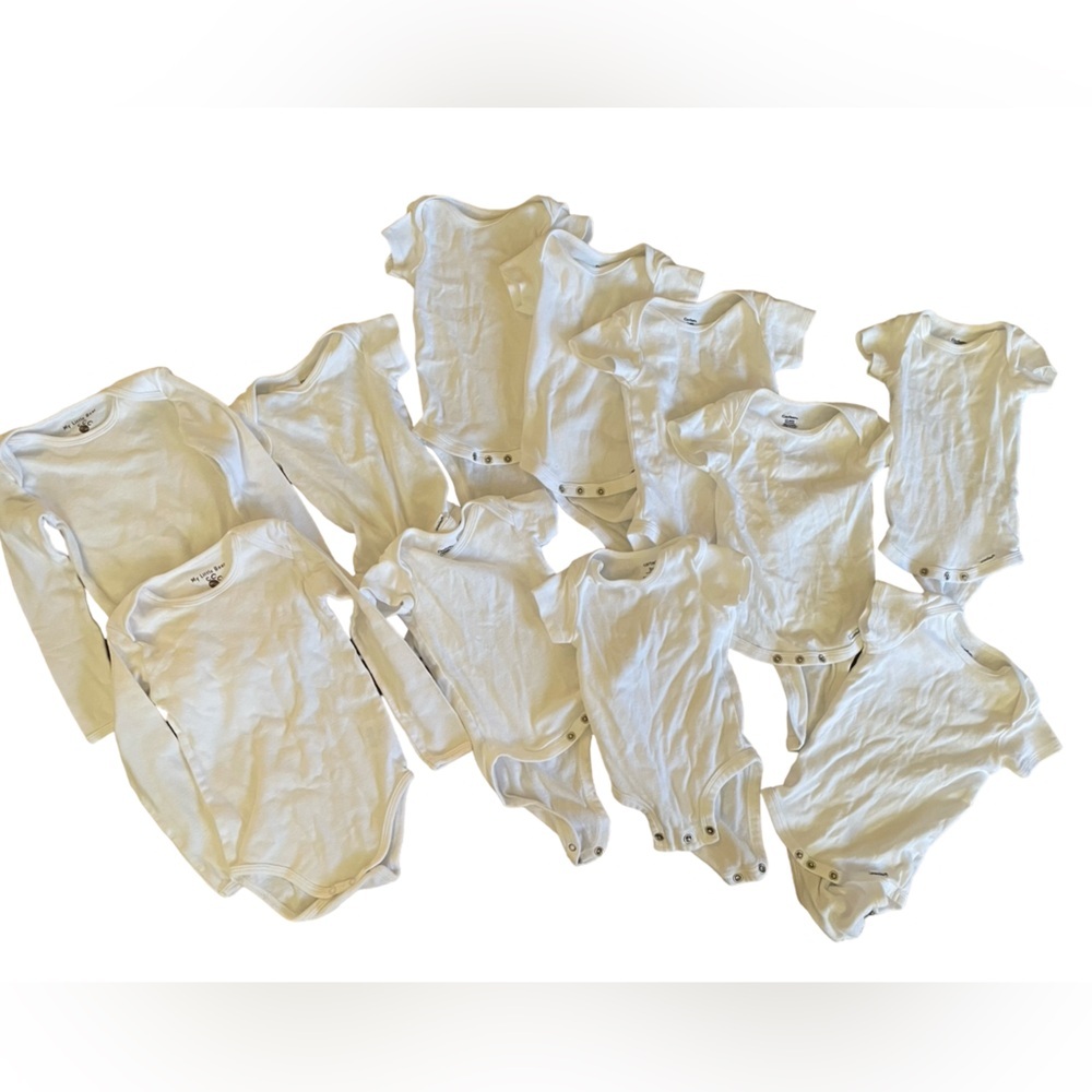 Bundle of 11 white onesies 3-6M